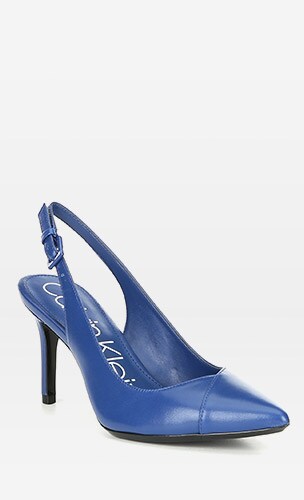 Blue leather pump on a grey background