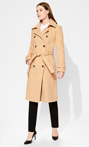 Woman in black Calvin Klein brand sheath dress